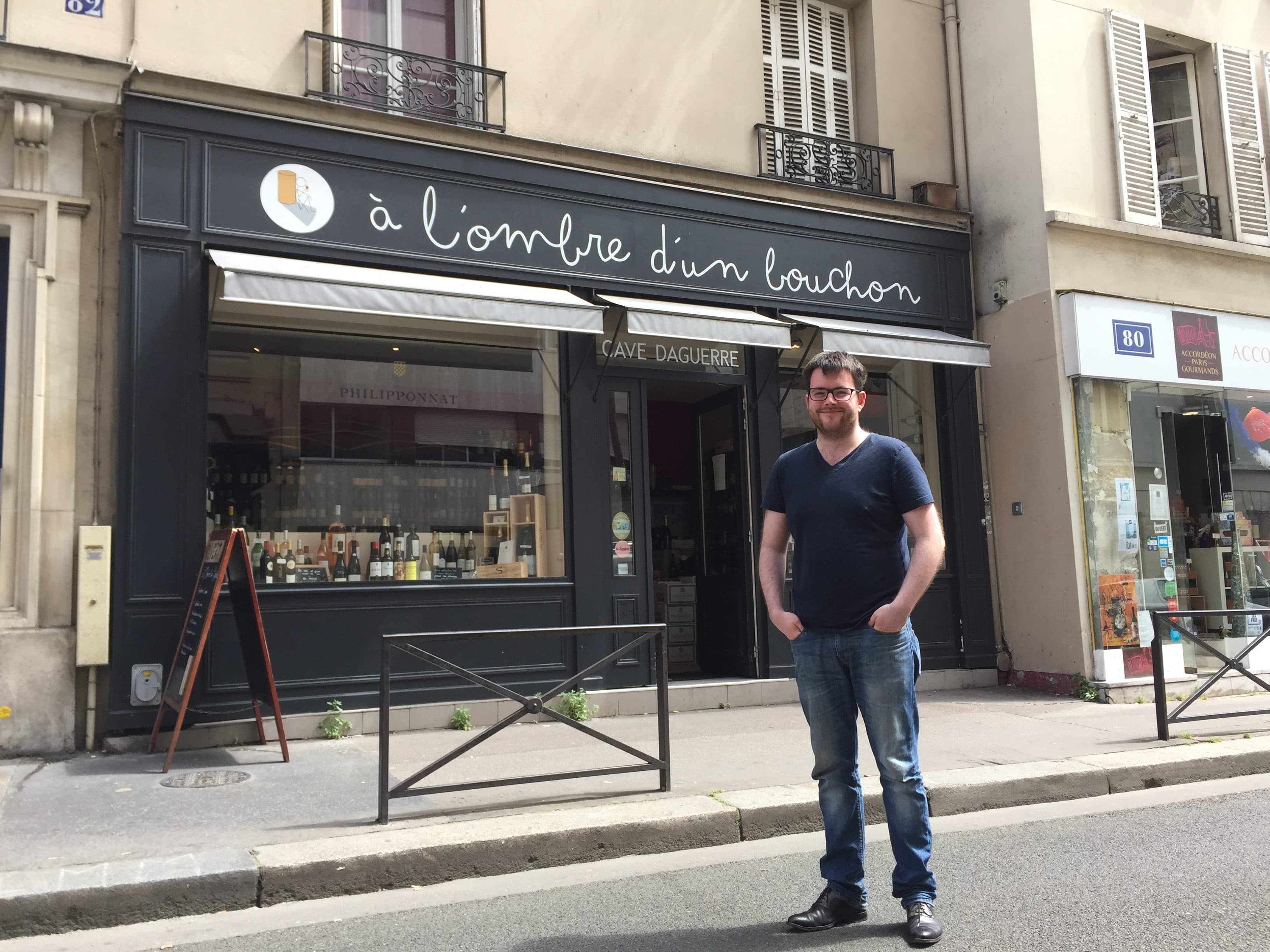 Daley Brennan outside à l'ombre d'un bouchon, his wine shop in Paris